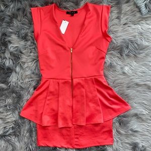Brand New....Sleeveless peplum mini-dress.